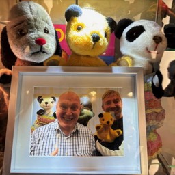 Sooty, Sweep and  Soo above a picture of Richard Caddel and Martin Price/